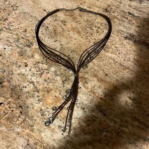 SILPADA Multi Strand Brown Leather Necklace Cinched at Neck with Silver Beads.